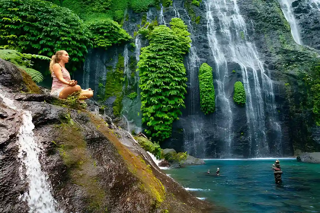 Woman in Banyumana Twin Waterfall